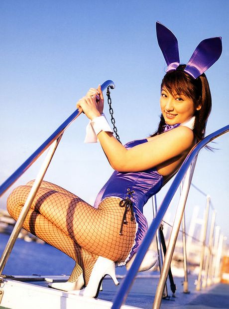 Steamy asian babe poses in several different sexy costumes