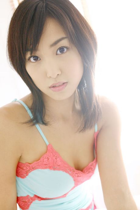 Enticing asian fox tease with her short hair and milky skin
