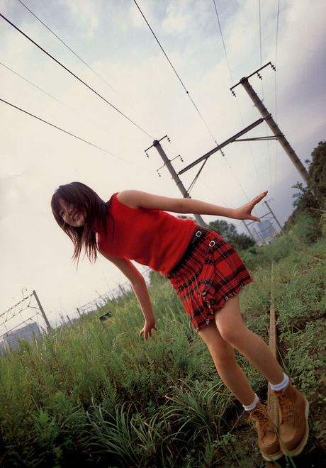 Asian babe is adorable in her school girl outfit and pig tails