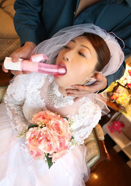 Asian amateur girl with small tits toying her pussy with a dildo outdoors