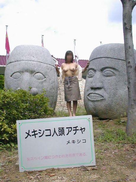 Asian amateur girl strips and shows her curves in the outdoor pool