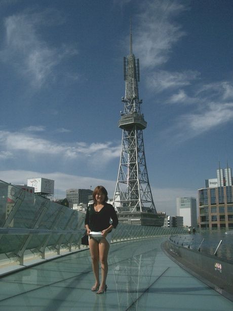 Asian amateur girl strips and shows her big butt and tits in public