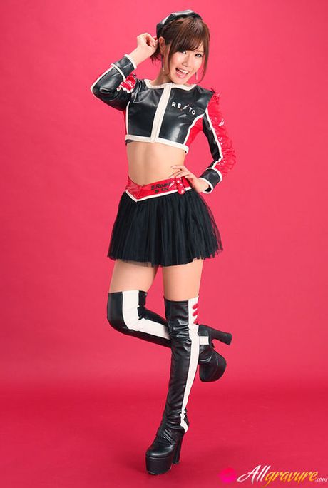 Ai Kumano Asian is leering chick in long boots and short skirt