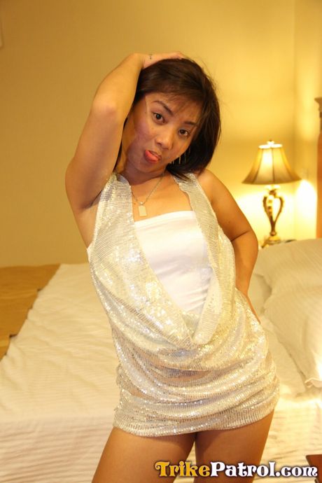 Asian teen Joy strips and shows her tiny tits and ass in a solo