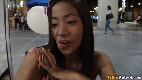 Asian teen Lalaine strips and fingers her twat while playing with her tits