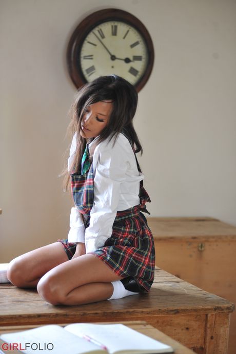 Asian schoolgirl Ayla Sky strips and shows her tiny tits and pussy