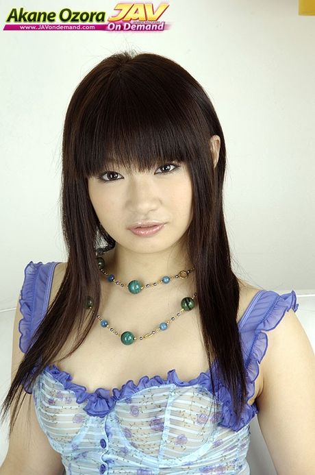 Stunning Asian MILF AKANE OZORA strips to her stockings and heels