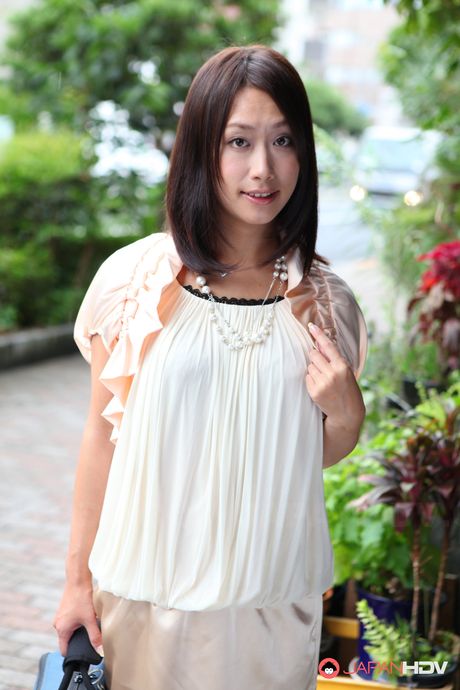 Stunning Japanese cutie Yayoi Yanagida in a sexy dress shows her body
