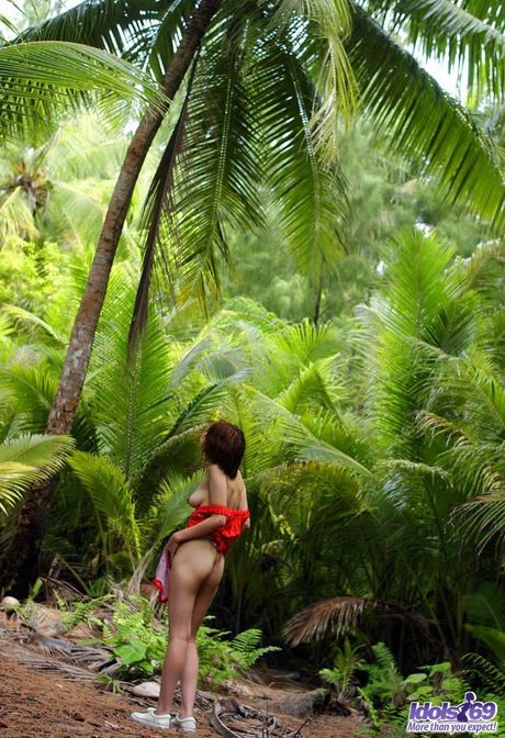 Super hot Japanese Minami Aikawa presents her hot butt & her tiny tits outdoors