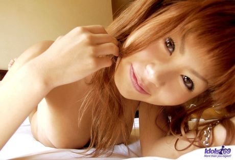 Japanese tramp Aki proudly shows off her tight body and hairy sexy pussy