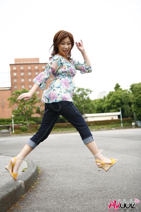 Hot Asian Keiko Morikawa demonstrates her big ass and tits in a solo striptease