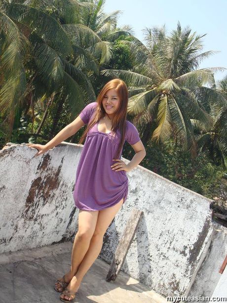 Asian babe with small boobs strips and shows her hot ass outdoors