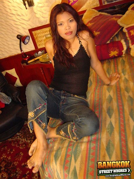 Asian teen with a tiny tits and a big booty strips and fucks a guy