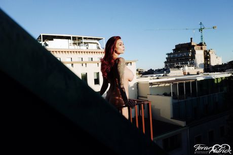 Hot Asian MILF Tera Patrick exhibits her big melons and ass in a solo