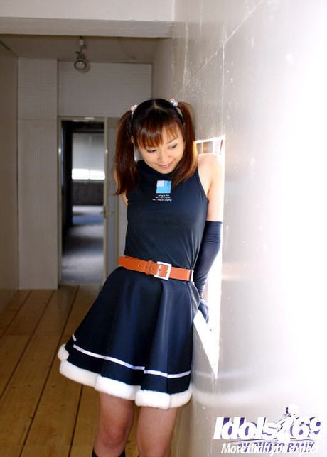 Svelte japanese teen Akane bares small tits and hairy beaver